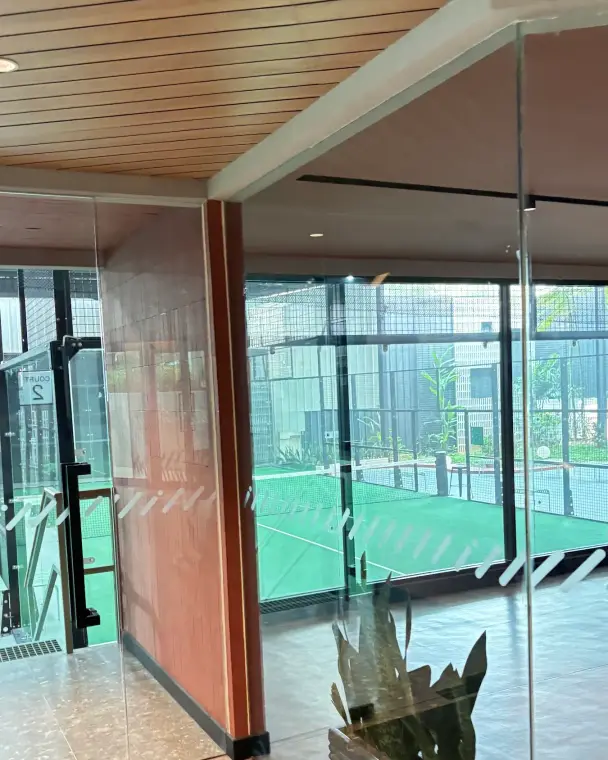 Glass door onto the courts